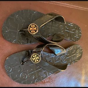 Tory Burch black patent flip flops